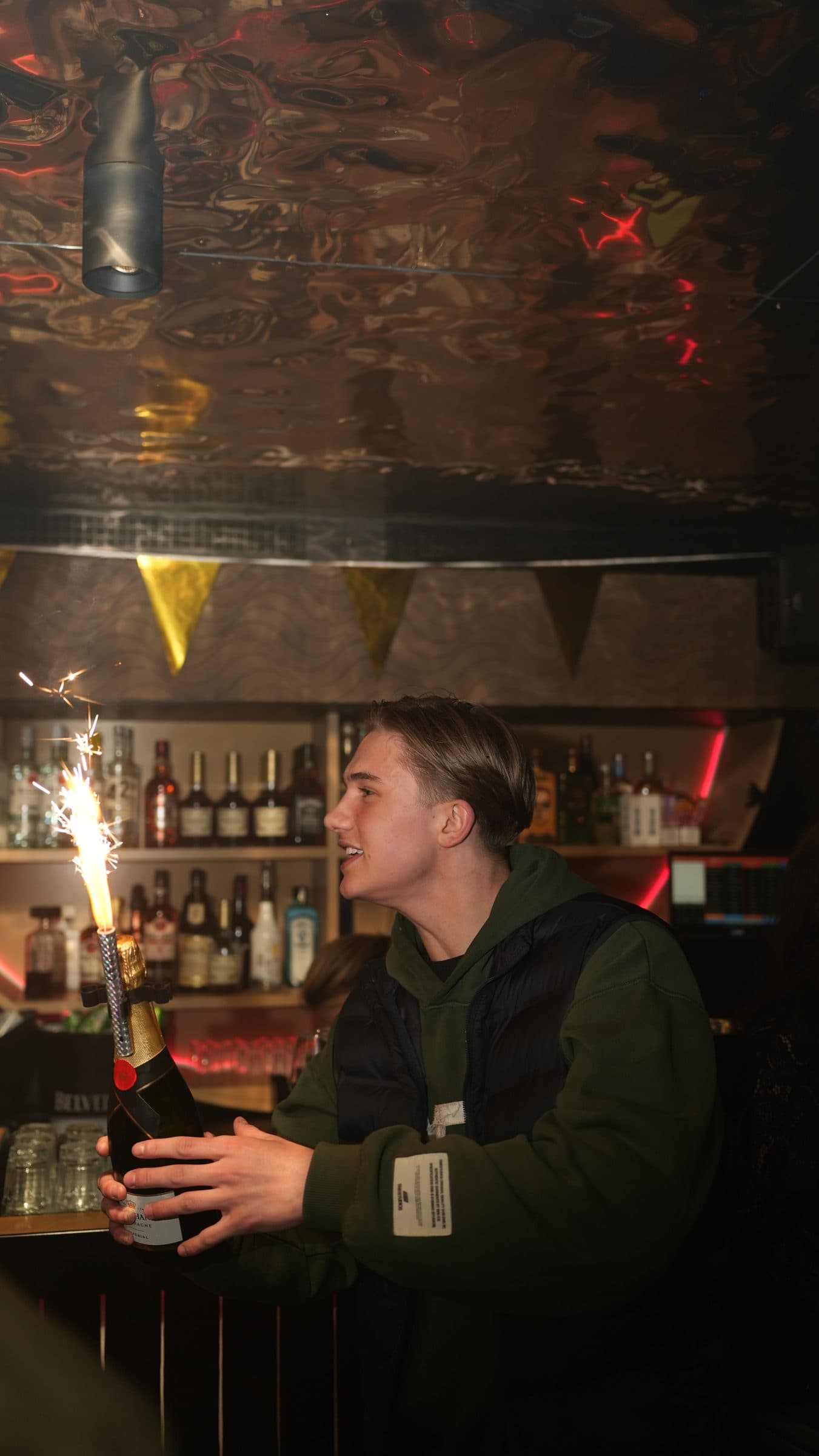 Bottle service with a sparkler at a bar