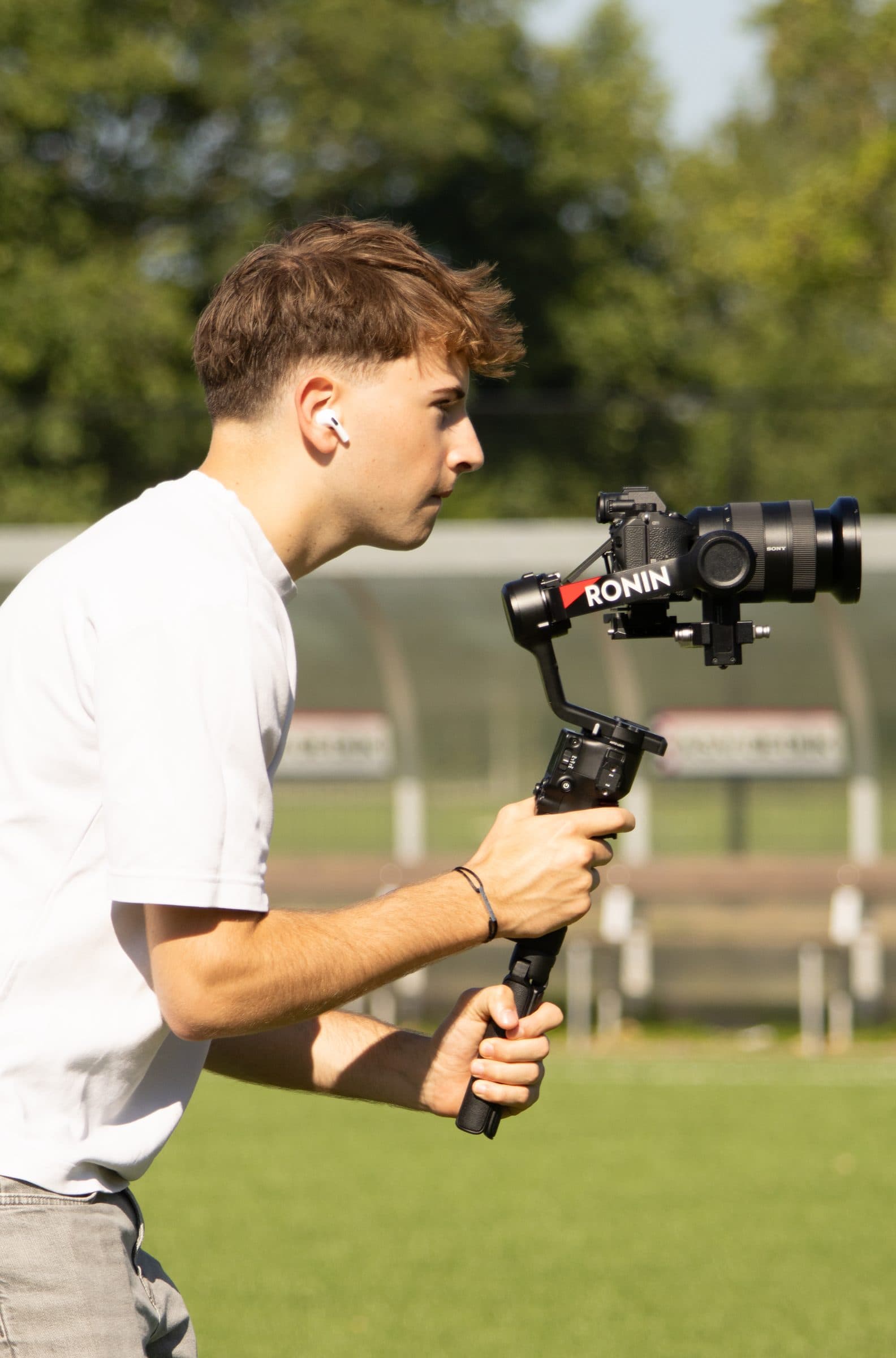 Floris directing a shoot pitch-side
